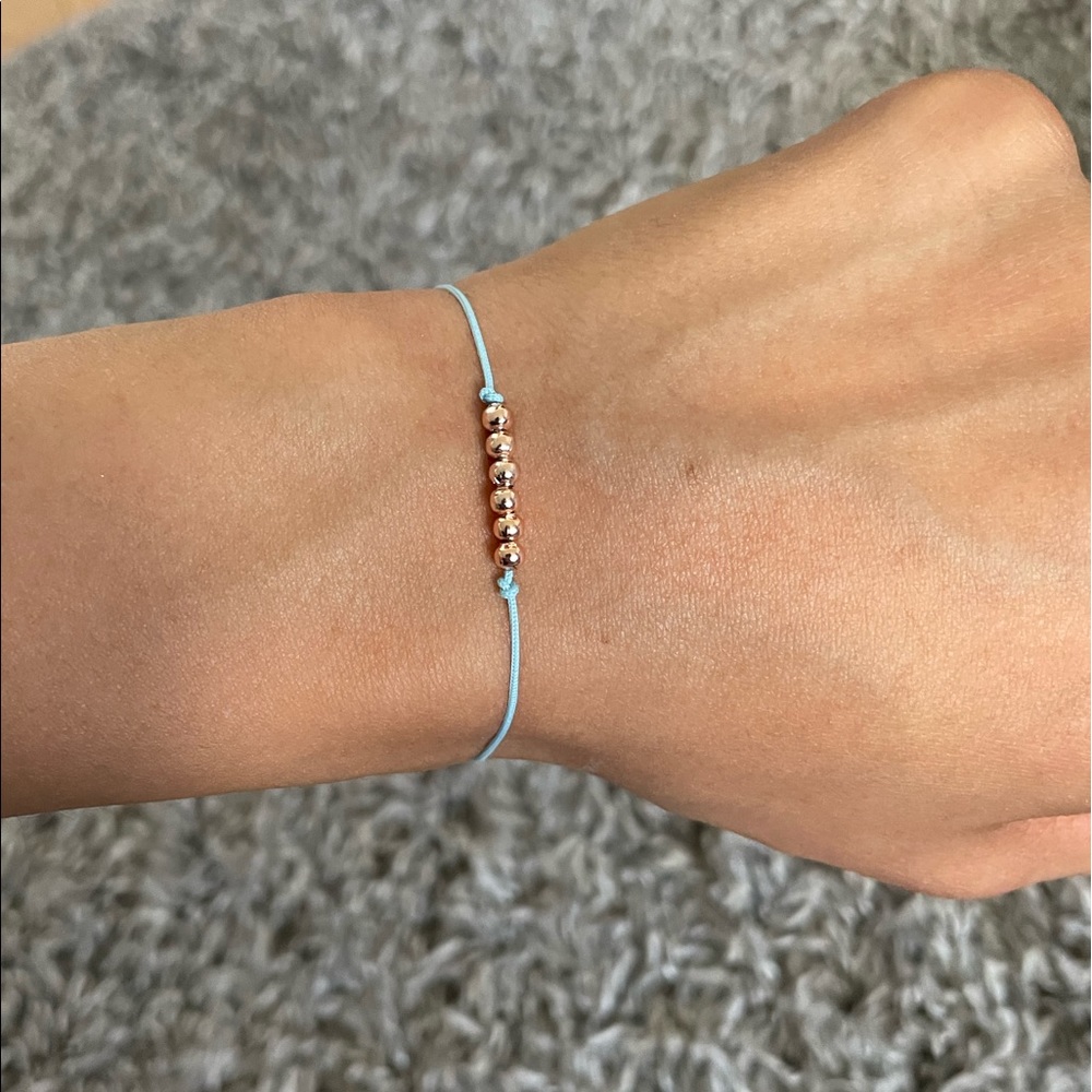 Hand made bracelet with gold beads